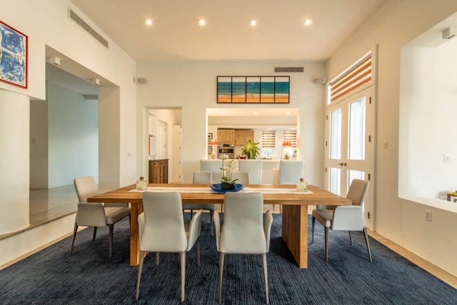 dining-table-blue-carpet-kitchen-open-view