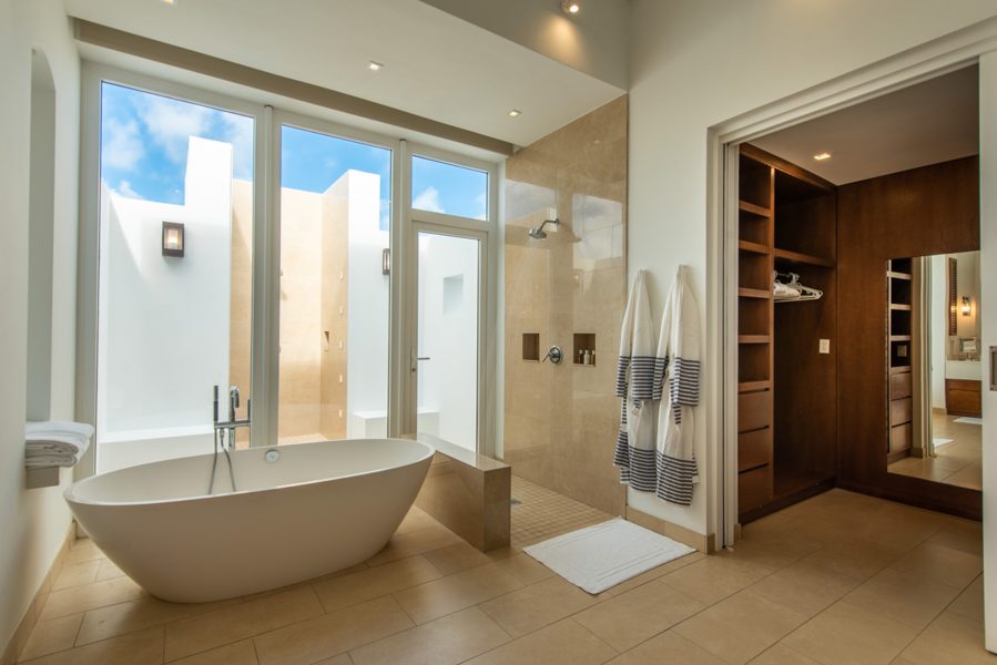 master-bathtub-walk-in-closet-outdoor-shower-view